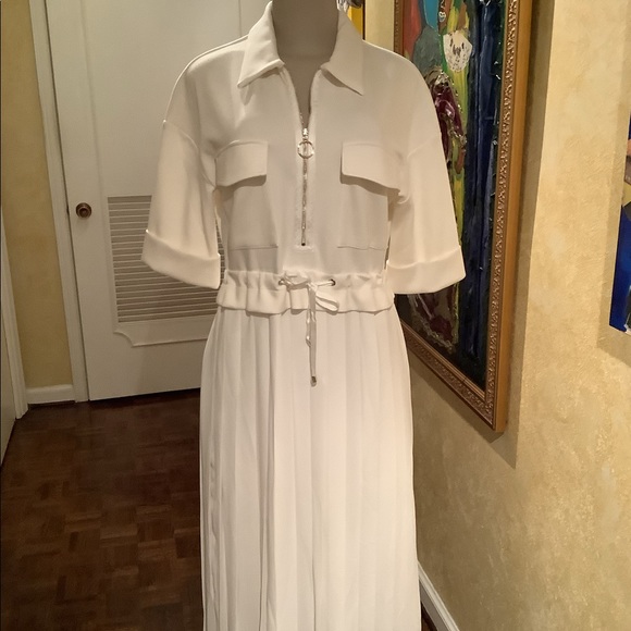 Ashley USA Dresses & Skirts - Pocket and zipper detailed midi dress.